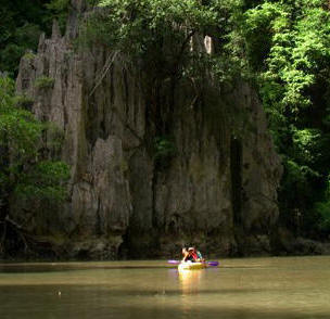 Phang Nga Bay Day Tours with canoeing on the water, moutain background